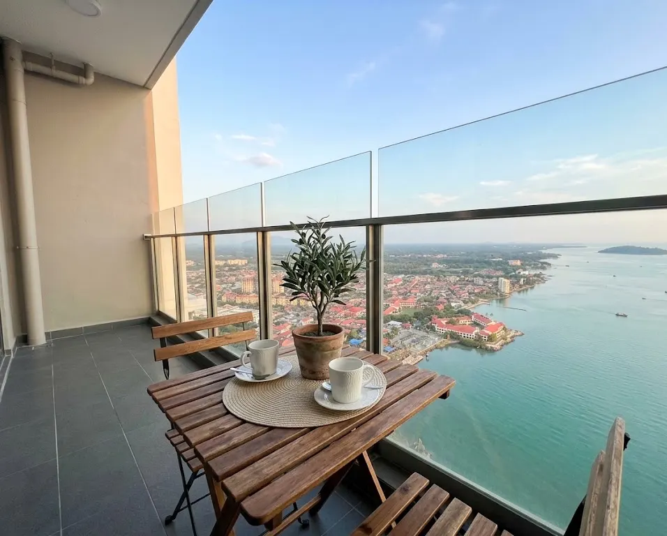 Private balcony with sea view over Malacca at Silverscape Residence